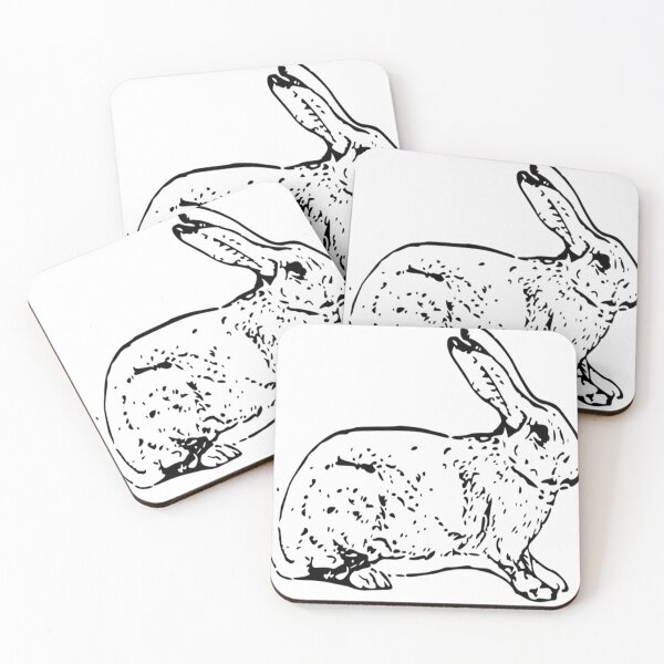 Item preview, black and white rabbit sitting still scared designed and sold by ClaraPer499.