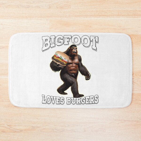Item preview, Bigfoot Loves Burgers Funny Bigfoot Carrying A Giant Cheeseburger designed and sold by DonnaPeaches.
