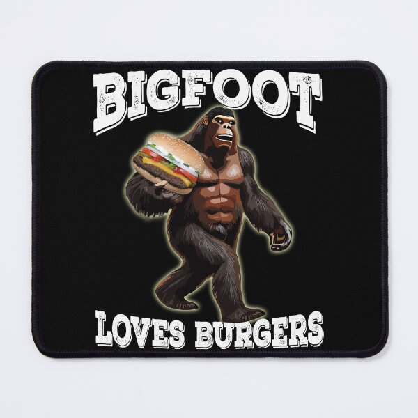 Item preview, Bigfoot Loves Burgers Funny Bigfoot Carrying A Giant Cheeseburger designed and sold by DonnaPeaches.