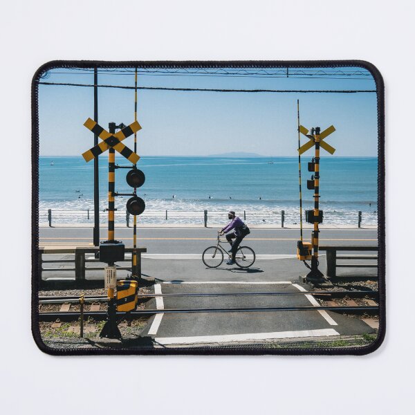 Item preview, Cyclist Riding Coastline Alongside Railway on a Summers Day designed and sold by JonesyDave.