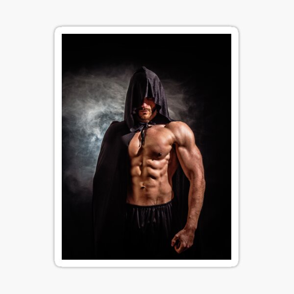 Scary Muscular Young Man with Pointed Hood on Naked Body Stock