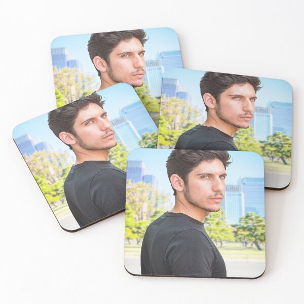 Item preview, Head and shoulders shot of one handsome young man with green eyes in urban setting, looking at camera, wearing t-shirt designed and sold by Mercurius-M.