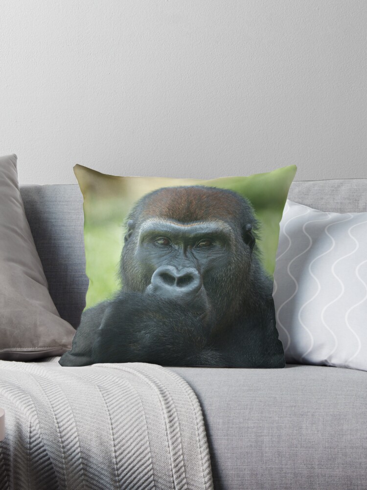 Throw Pillow young gorilla sticking up its middle finger 