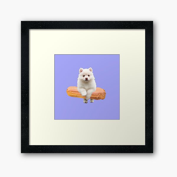 Cute Alaskan Malamute Dog jumping an éclair by Alice Monber Framed Art Print