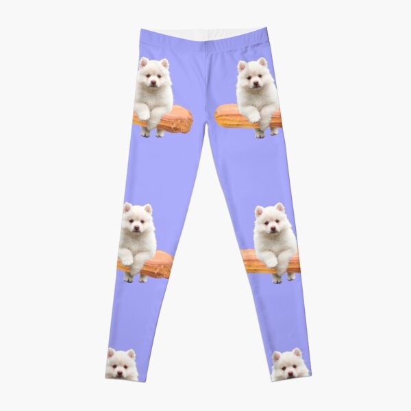 Cute Alaskan Malamute Dog jumping an éclair by Alice Monber Leggings