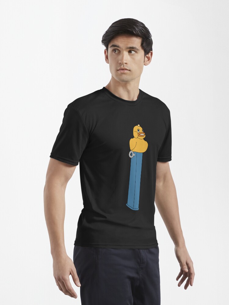 Imagen 3 de 7, Camiseta deportiva con la obra Reliquia peligrosa de la serie de televisión Silo (dispensador PEZ), diseñada y vendida por TerenasMenethil.