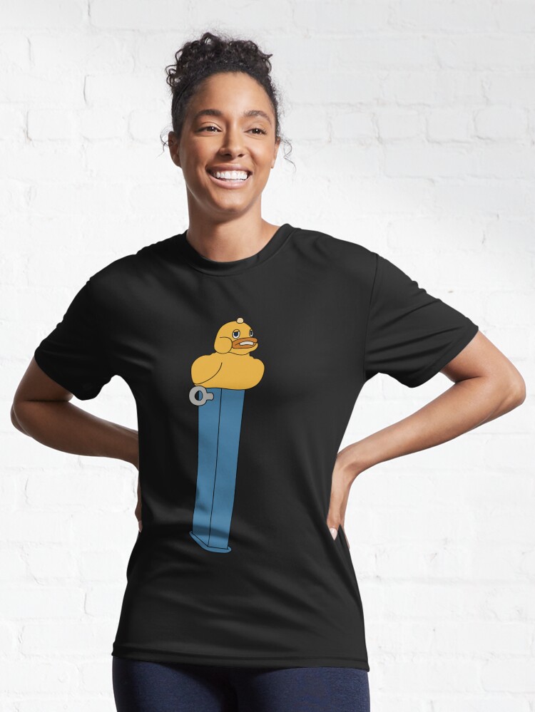 Imagen 6 de 7, Camiseta deportiva con la obra Reliquia peligrosa de la serie de televisión Silo (dispensador PEZ), diseñada y vendida por TerenasMenethil.
