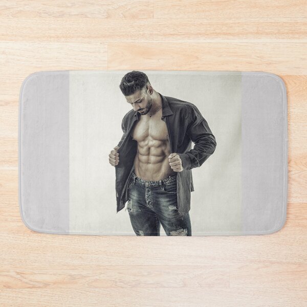 Item preview, Muscular bodybuilder undressing, opening shirt on nude torso designed and sold by Mercurius-M.