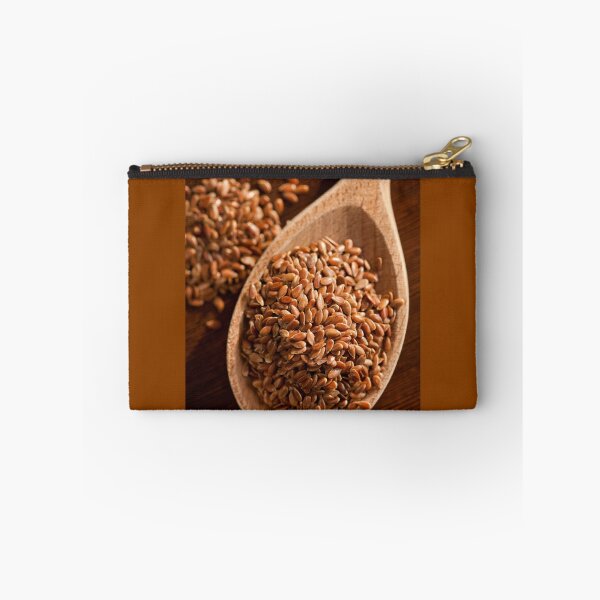 Item preview, Brown linseeds portion on wooden spoon designed and sold by Arletta Cwalina.