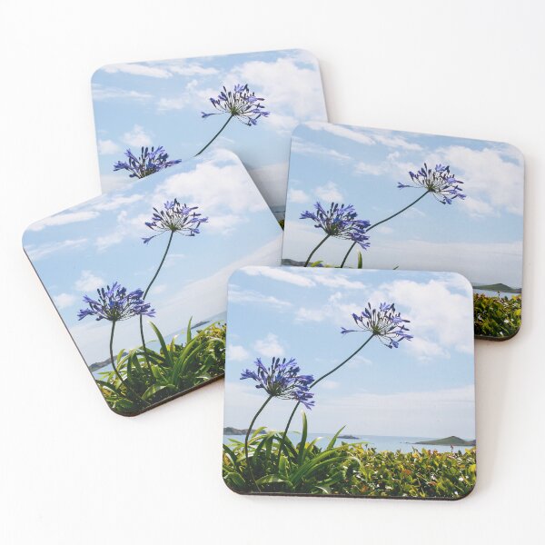 Item preview, Blue Agapanthus Stems Art Print - Against the Clear Blue Sky in the Isles of Scilly, Cornwall designed and sold by Oh Halo Berry.