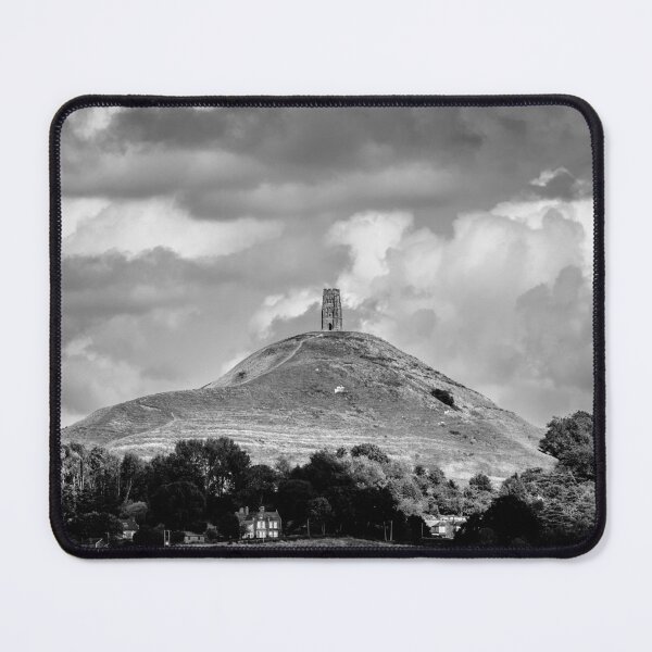 Item preview, St. Michael's Tower atop Glastonbury Tor, dramatic sky above. designed and sold by bailey-cooper.