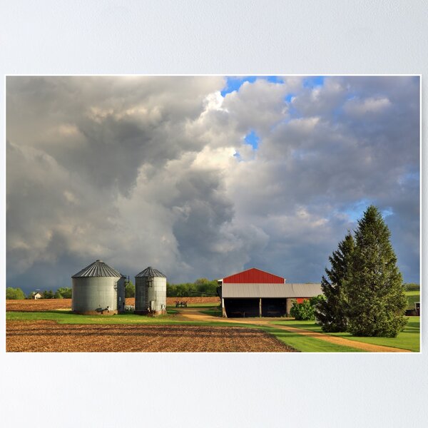 Farm Buildings and Storm Clouds Poster