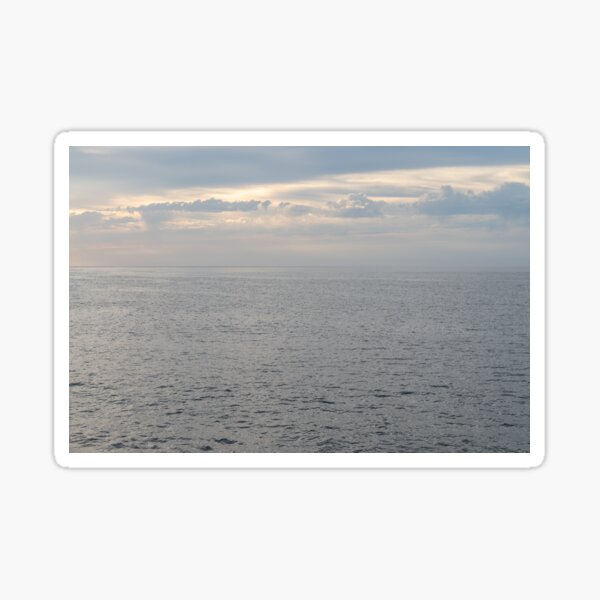 Silver seawater and warm gray clouds. Serenity at the Mediterranean Sea Sticker