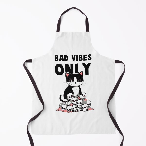 Item preview, Black cat sits below a pile of skulls Saying bad vibes only, in the style of bold graphic illustrations, cute cartoonish designs, optical illusion designed and sold by SE7VENTH.