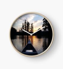 Reloj Atardecer en un lago