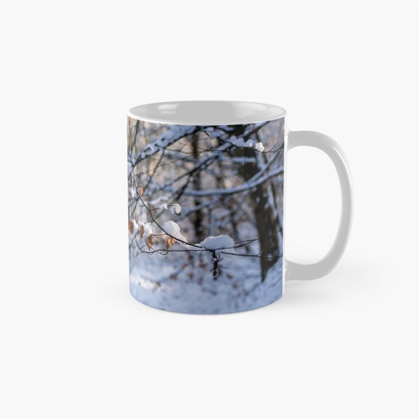 Item preview, Snowy woodland with branches with Beech Leaves hanging on designed and sold by Susan Reilly.
