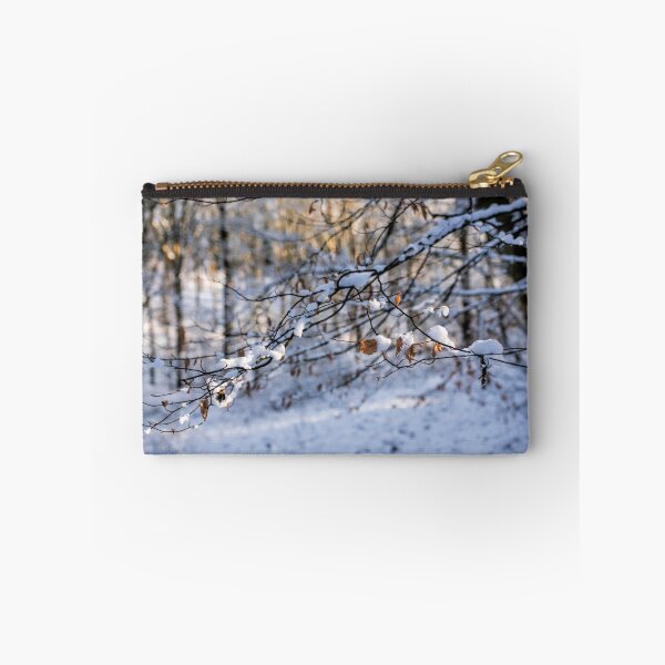 Item preview, Snowy woodland with branches with Beech Leaves hanging on designed and sold by Susan Reilly.