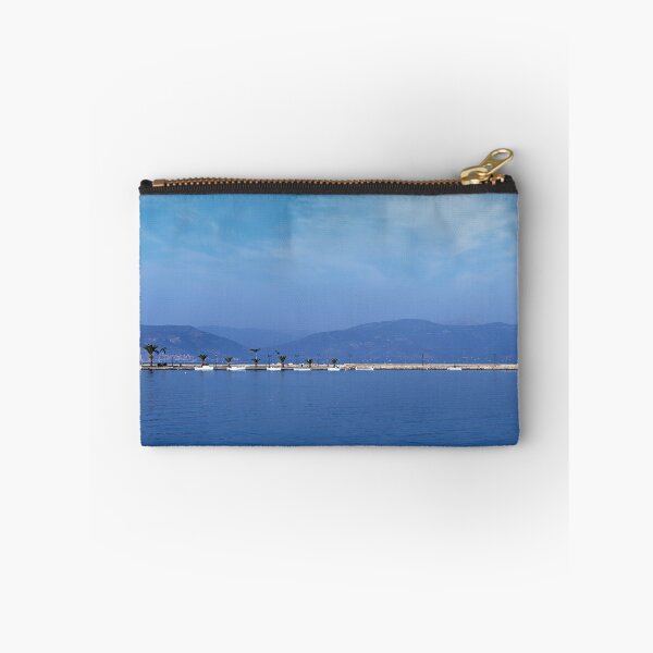 Item preview, small white boats and blue sea in the harbor Nafplio Greece designed and sold by goceris.