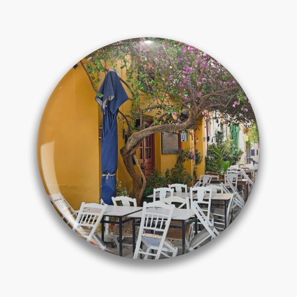 Item preview, Restaurant and houses in the narrow streets of Nafplion town with Bougainvillea flowers designed and sold by goceris.