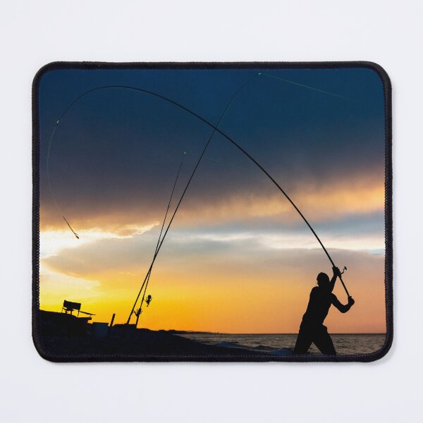 Item preview, Fisherman cast fishing rods on the seashore at a dramatic sunset. designed and sold by Yuri Hoyda.