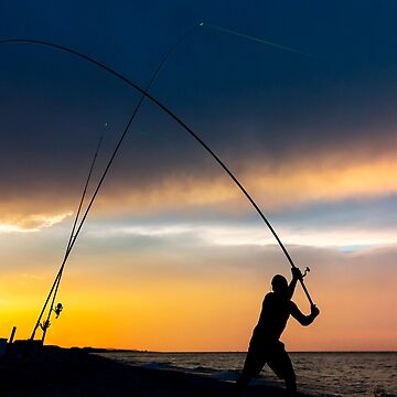 Fisherman cast fishing rods on the seashore at a dramatic sunset. | Sticker