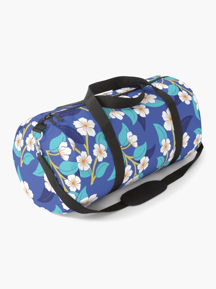 Thumbnail 1 of 3, Duffle Bag, Boho tossed flower pattern in blue designed and sold by jennifereladd.