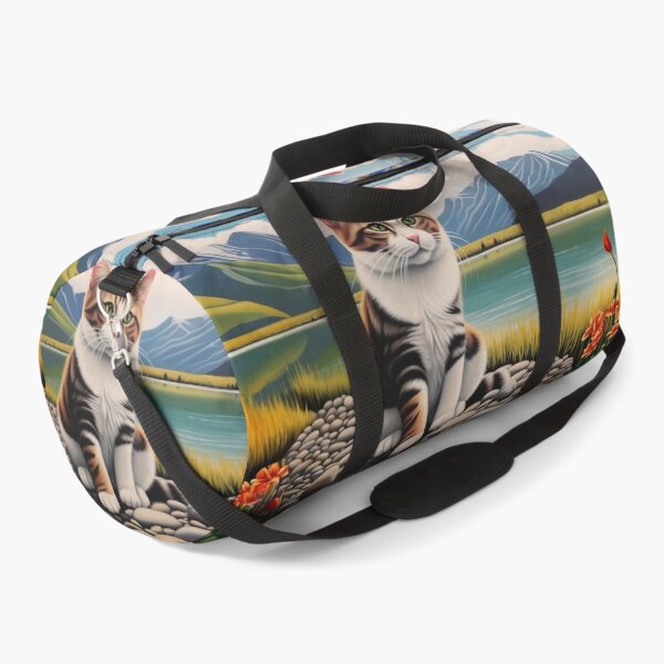 Item preview, A beautiful tiger striped tabby cat sits by a scenic mountain lake designed and sold by Liljinkzy.