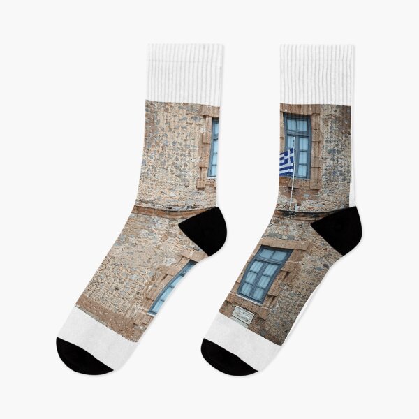 Item preview, an old stone building with a Greek flag, Syntagma Square, Nafplio designed and sold by goceris.