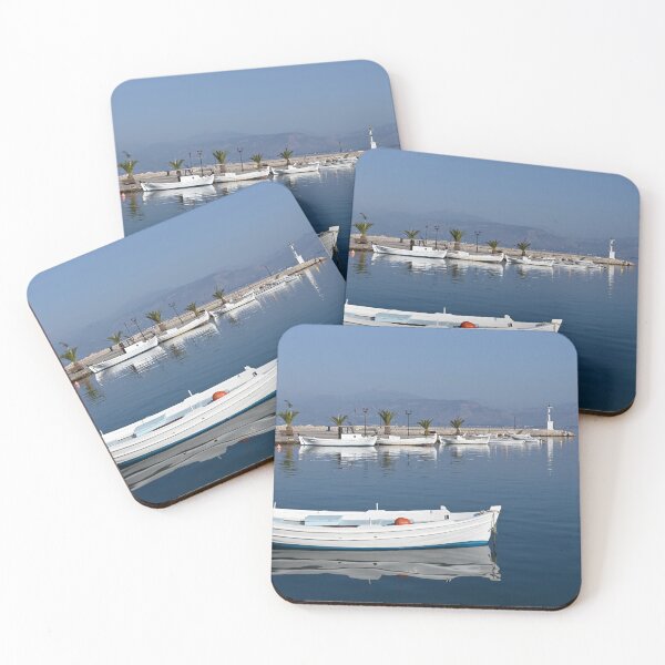 Item preview, White boats and blue sea in the harbor Nafplio Greece designed and sold by goceris.