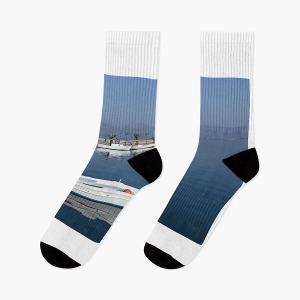 Item preview, White boats and blue sea in the harbor Nafplio Greece designed and sold by goceris.