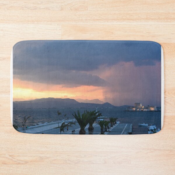 Item preview, stormy sky and sunset over the castle Bourtzi in Nafplio, Greece designed and sold by goceris.