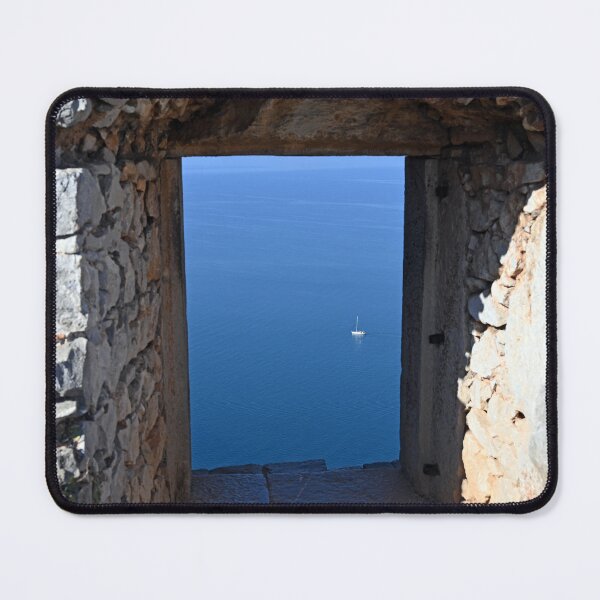 Item preview, View of the sea and sailboat through an old stone window on the Palamidi fortress Nafplio designed and sold by goceris.