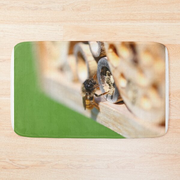 Item preview, Red mason bee landing at her nest chamber designed and sold by GreyFeatherPhot.