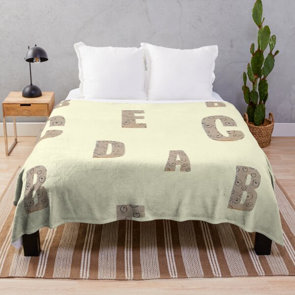 Item preview, Alphabet letter beige texture paper yellow pattern designed and sold by Yana Mustafina | Boho Soulful Designs.