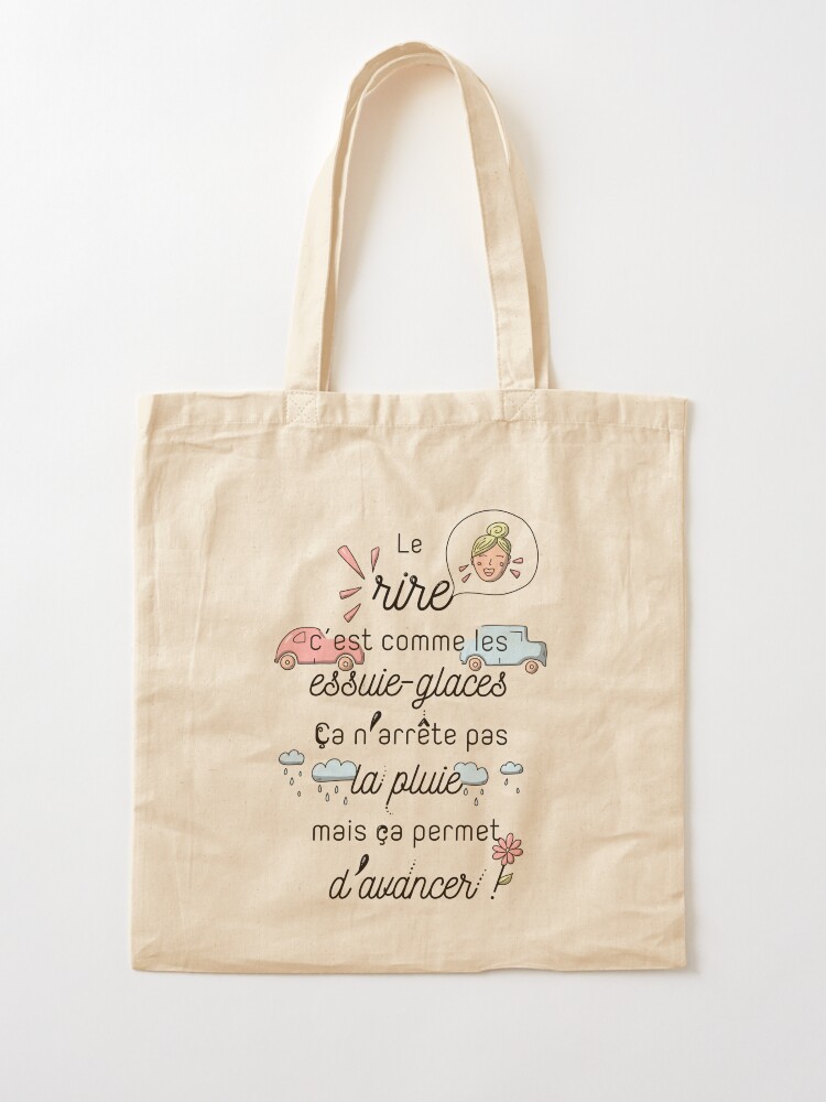 Aperçu 2 sur 5. Tote bag avec l'œuvre Citation : Le rire c'est comme les essuie-glaces créée et vendue par GribouillStreet.