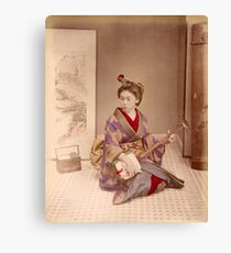 Geisha playing a samisen Canvas Print