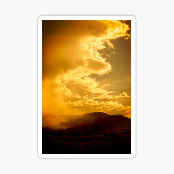 Sepia toned storm clouds raining on the mountains, Arizona. Sticker