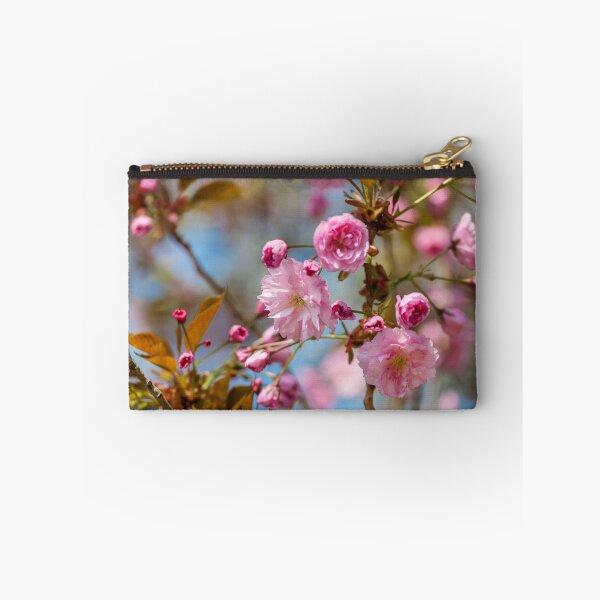 Item preview, Blooming sakura tree on blue background in the  park designed and sold by torishaa.