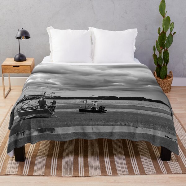 Item preview, Fishing boat under stormy skies in black and white designed and sold by franck380.