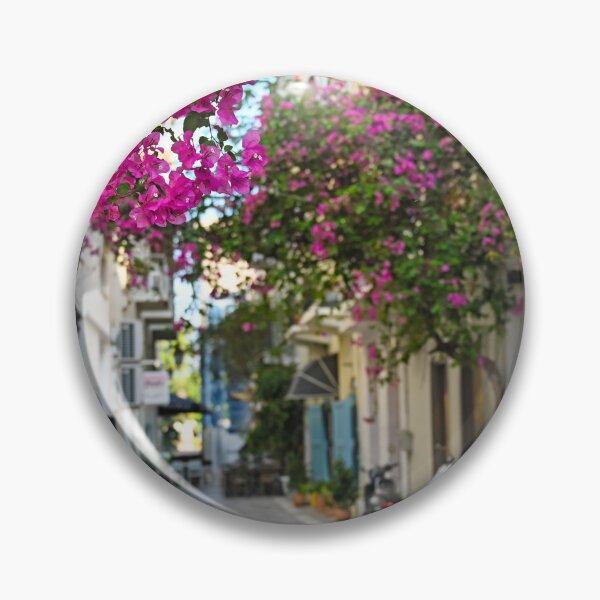 Item preview, Restaurant and buildings in the narrow streets of Nafplion town with Bougainvillea flowers designed and sold by goceris.
