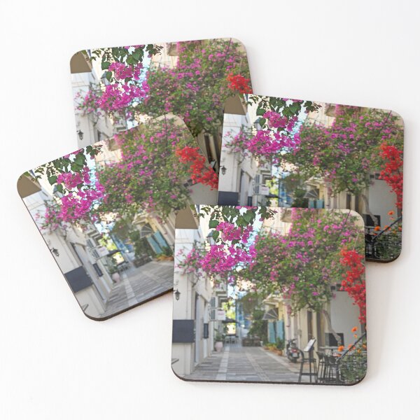 Item preview, Restaurant and buildings in the narrow streets of Nafplion town with Bougainvillea flowers designed and sold by goceris.