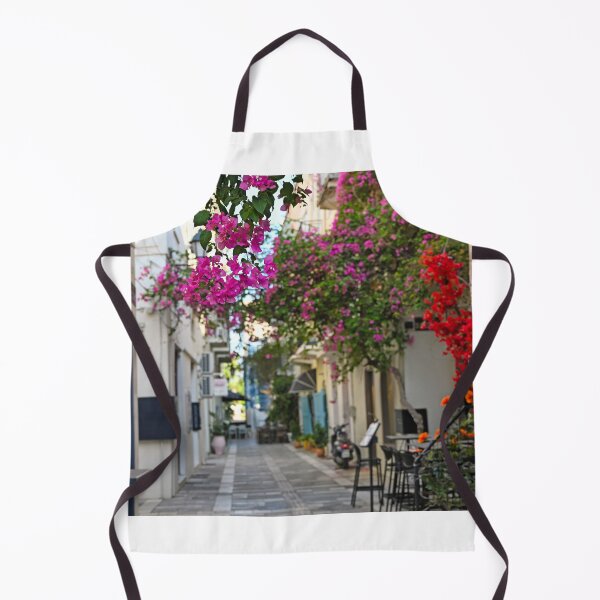 Item preview, Restaurant and buildings in the narrow streets of Nafplion town with Bougainvillea flowers designed and sold by goceris.