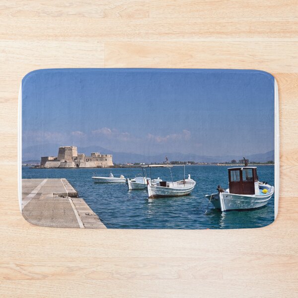 Item preview, Small fishing boats and and Bourtzi fortress in Nafplio, Peloponnese, Greece designed and sold by goceris.