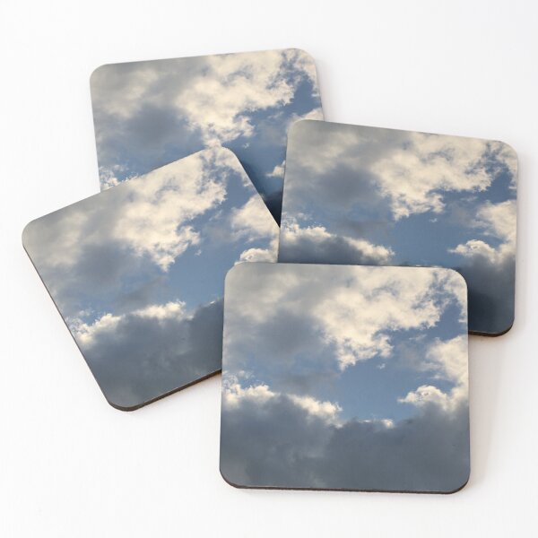Item preview, Clouds in a blue sky reflecting the orange sun designed and sold by EwanP123.
