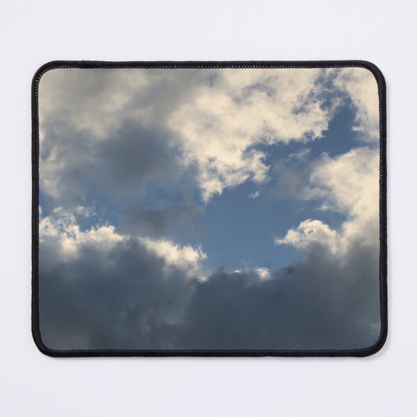 Item preview, Clouds in a blue sky reflecting the orange sun designed and sold by EwanP123.