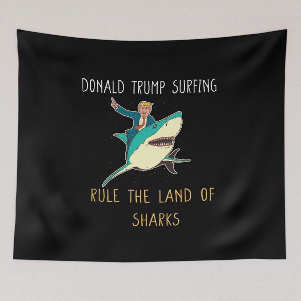 Item preview, Donald TrumpSurfing rule the land of sharks designed and sold by SVRT SHIRT.