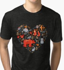 Fairy-tale forest. Fox, bear, raccoon, owls, rabbits, flowers and herbs on a blue background. Tri-blend T-Shirt