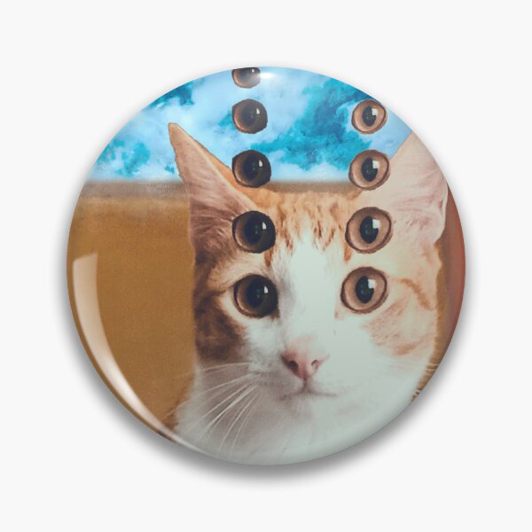 Item preview, orange cat with multiple eyes, in a desert with blue sky - surrealist - surrealism- wird cat designed and sold by PizzaAnitashop.