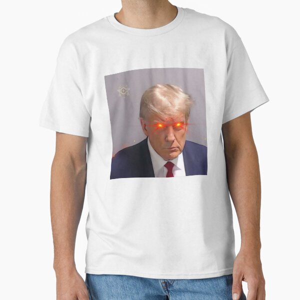 Artikel-Vorschau von Trump Mugshot Laser Eyes, designt und verkauft von apricot-tees.