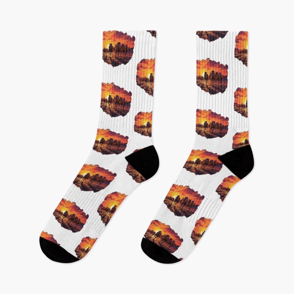 Item preview, Camels with bodwins walk against the backdrop of a sunset in the desert designed and sold by abmkf.